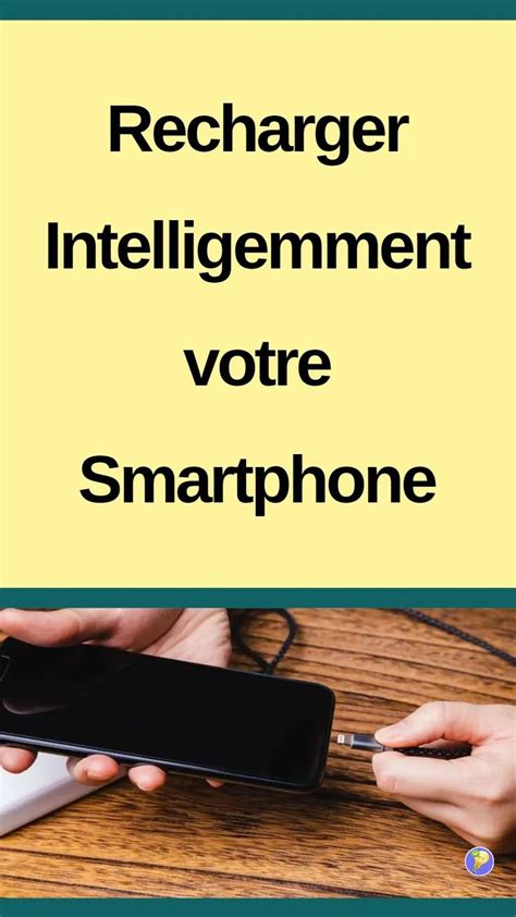 Two Hands Holding A Smart Phone With The Text Recharger Intelligente