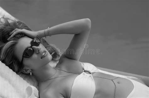 Beautiful Woman Wears Luxurious Bikini Swimsuit Posing In The Swimming Pool Female Model Relax