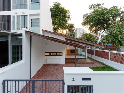 Simple Single Storey Terrace House Design With A Pitched Ceiling