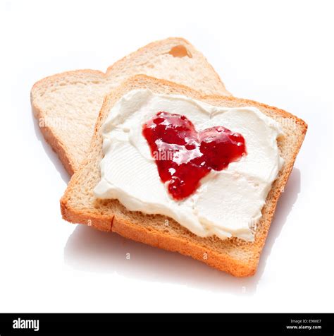 Two Tasty Slices Of Bread With Jam And Butter Stock Photo Alamy