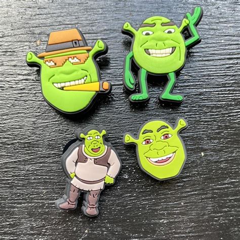 4 Shrek Crocs jibbitz charms. Brand new, only... - Depop