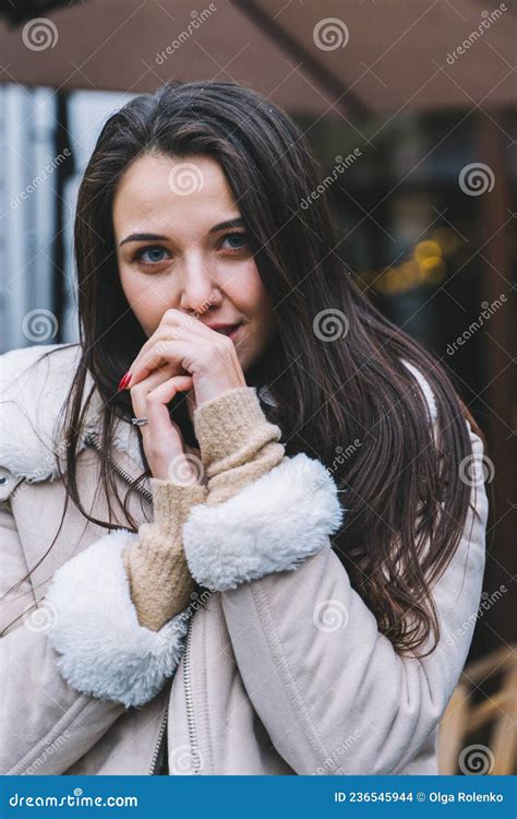 Beautiful Smiling Woman With Long Hair Wearing Warm Jacket Walk Down