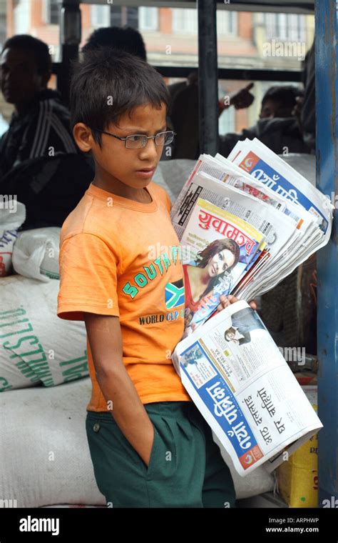 Boy Selling News Papers Nepal Stock Photo Alamy