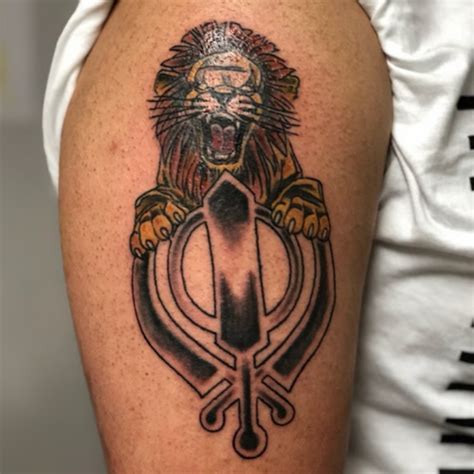 Khanda With Lion Tattoo Designs