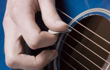 How To Strum A Guitar Easily Master Strumming Music Grotto