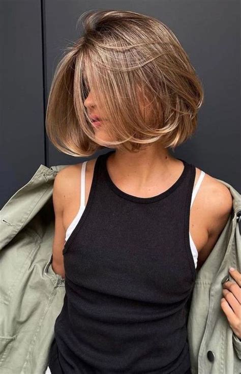 A Gorgeous Boy Bob Haircut On Naturally Sunkissed Brunette Hair With