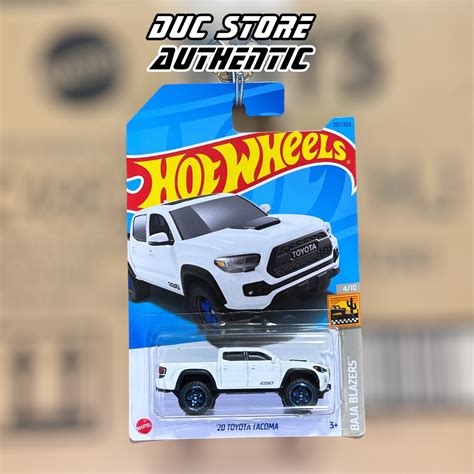 ducstore Xe mô hình HKG Hot Wheels Toyota Tacoma Super White Shopee Việt Nam