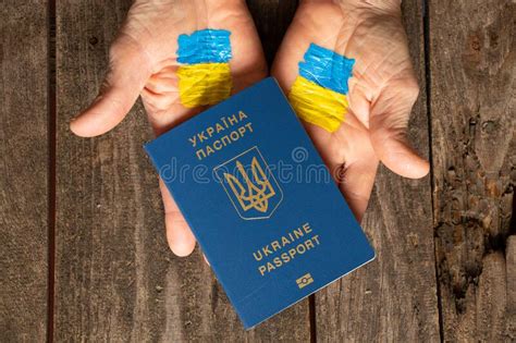 The National Flag Of Ukraine Is Drawn On The Hands Of A Woman And Next