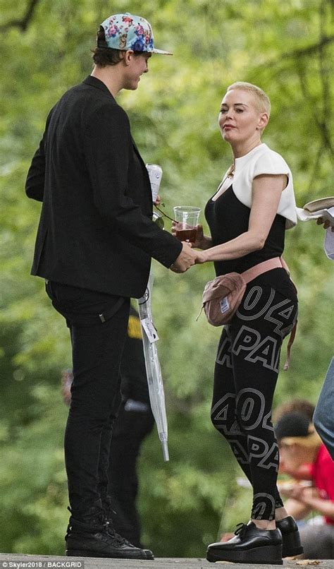 Rose McGowan Shows Off Bleach Blonde Hair During PDA Smoke Break With Her Mystery Man At Ozy