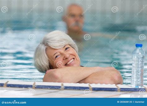 Back View Senior Woman Exercising In Swimming Pool Stock Image Image