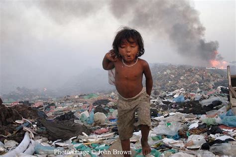 One of the youngest workers at The Stung Meanchey Landfill in Phnom ...