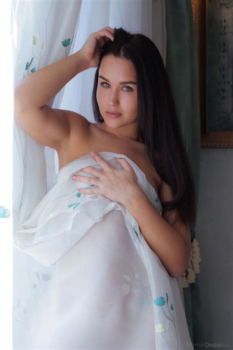 Luscious Naked Brunette With Long Hair