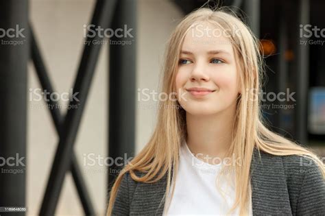 Closeup Outdoor Portrait Of A 13 Year Old Blonde Teenage Girl Stock