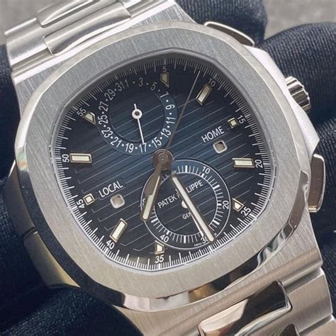 Patek Philippe Nautilus Travel Time Chronograph - COMPLEX METALS