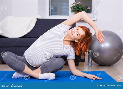 Pregnant Woman Doing Stretching Exercises At Home Stock Image Image