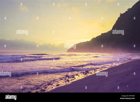 Hawaiian beach at sunrise Stock Photo - Alamy