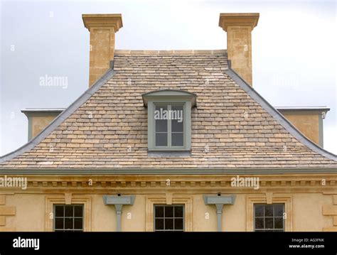 Cotswold Stone Building With Dormer Roof Windows At Longborough