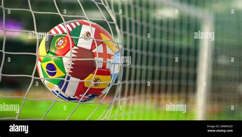 Soccer Football Ball With Flags Of World Countries Scoring Goal On A