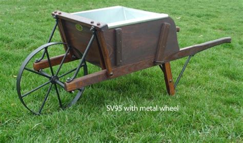 Old Fashioned Reproduction Wooden Wheelbarrows Garden Antique Planter Hubpages