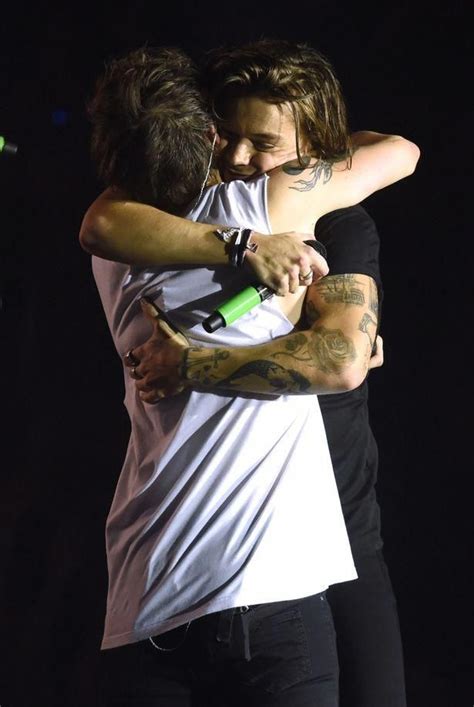 Louis Tomlinson And Harry Styles Hug During Final 1d Show