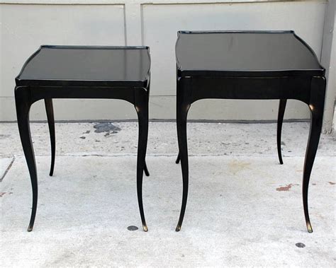 Set of elegant black lacquer nesting tables at 1stdibs