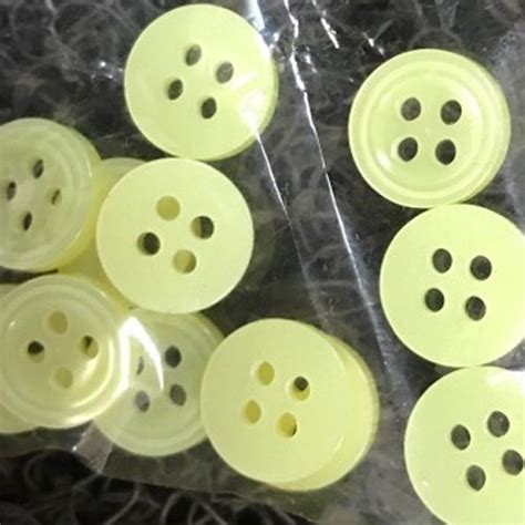 Yellow Round 4 Hole Plastic Button For Garments Packaging Type