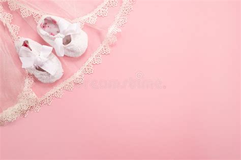 Christening Background With Baptism Baby Shoes Dress And Candle On