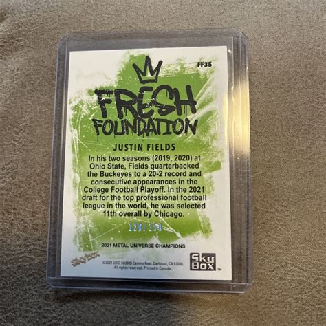 Skybox Metal Universe Champions Justin Fields Fresh Foundation Red