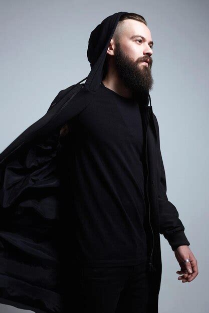 Premium Photo Fashion Man In Black Cloak And Hood