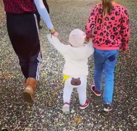 Robbie Williams' daughter Coco WALKS in rare video with big sister ...