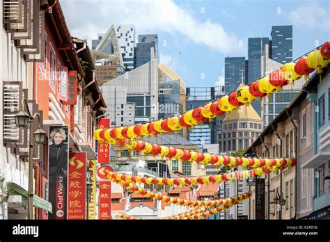 Singapore Chinatown View Of Skyscrapers From A Lane With Colonial