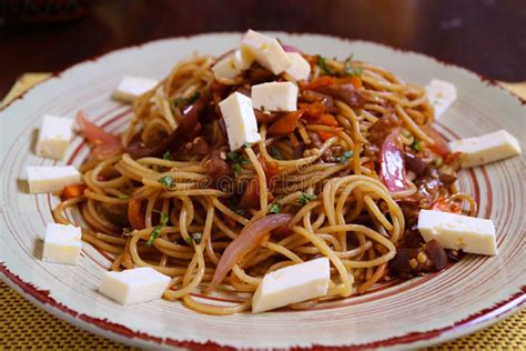 Plate Of Tallarin Saltado A Popular Peruvian Stir Fried Noodles With