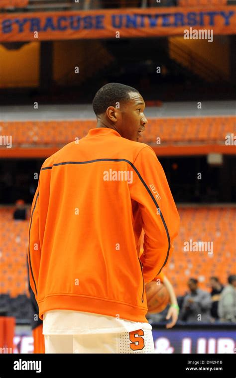 Syracuse Forward Wesley Johnson Stands At Half Court Before The Orange