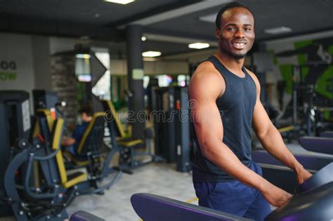 Black African American Young Man Doing Cardio Workout at the Gym Stock ...