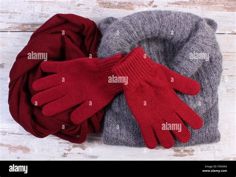 Woolen clothes for woman on old rustic wooden background, womanly ...