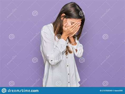 Young Beautiful Woman Wearing Casual Clothes With Sad Expression