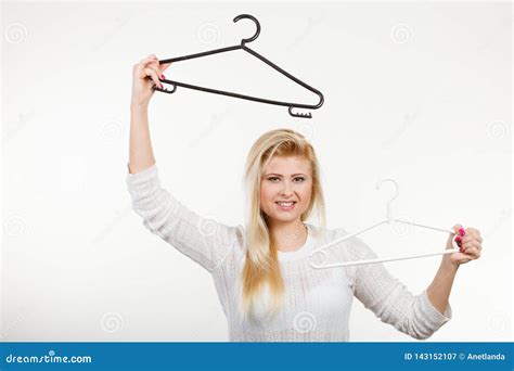 Woman Holding Clothes Hanger Stock Image Image Of Wardrobe Closet 143152107