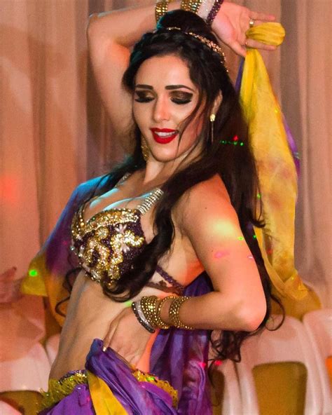 A Belly Dancer Is Posing For The Camera