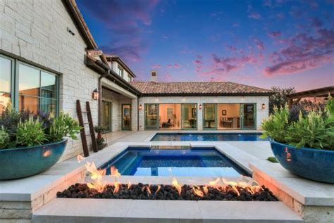 Modern Backyard With Swimming Pool and Sleek Fire Feature | 2019 HGTV's ...