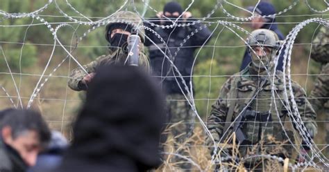 Poland-Belarus border reinforced by riot police, leaving hundreds of migrants stuck - National ...