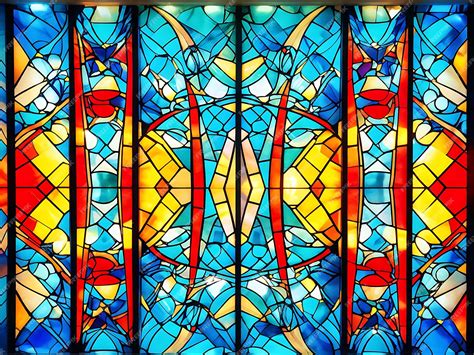 Abstract Stained Glass Window With Red Yellow And Blue Colors Premium Ai Generated Image