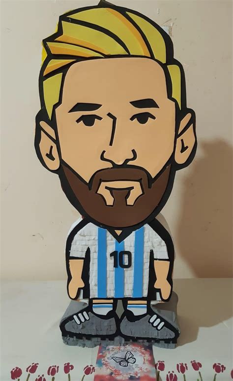 A Paper Cut Out Of A Man With A Beard And Soccer Jersey On It S Chest