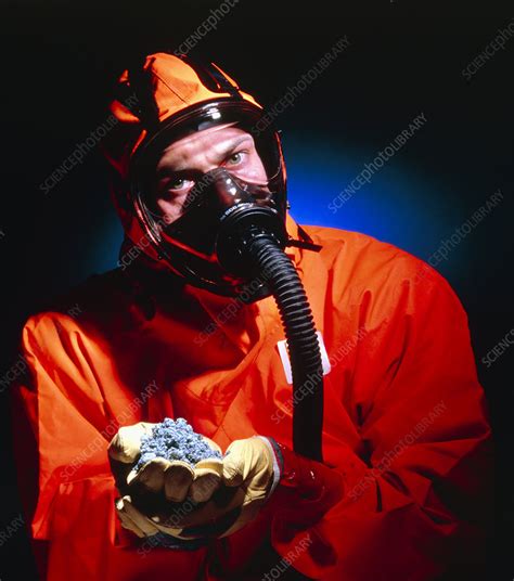 Protected Masked Worker Holds Asbestos Stock Image E8000239