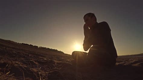 Man Praying at Sunset God Stock Footage Video (100% Royalty-free) 25245110 | Shutterstock