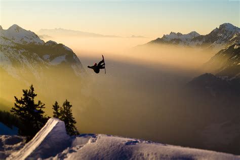 Silhouette Photo Of Person Plays Snowboard During Golden Hour Hd