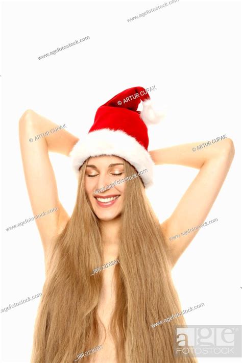 Woman Wearing A Santa Claus Hat With Long Hair Covering Her Naked Torso