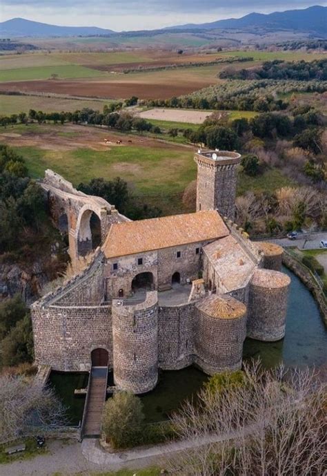 An Aerial View Of A Castle In The Countryside