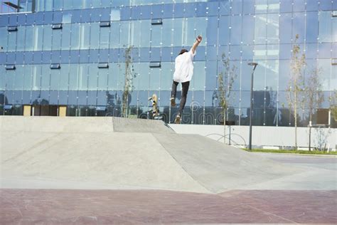 Skateboarder Doing a Trick in a Skate Park, Practice Freestyle Extreme ...