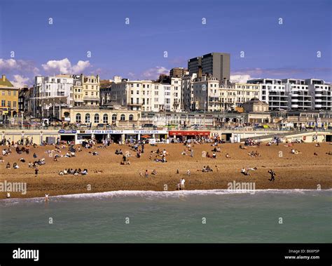 Sunbathing brighton beach hi-res stock photography and images - Alamy