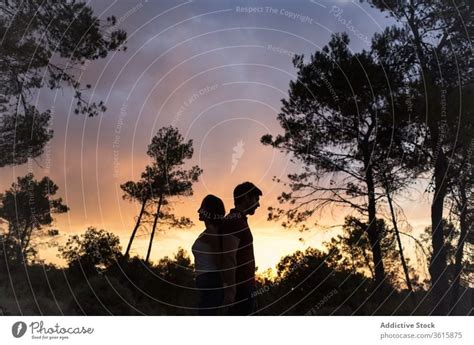 Couple In Love In Forest During Sundown A Royalty Free Stock Photo